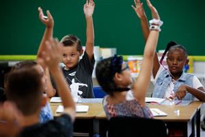 Students Raising Hands